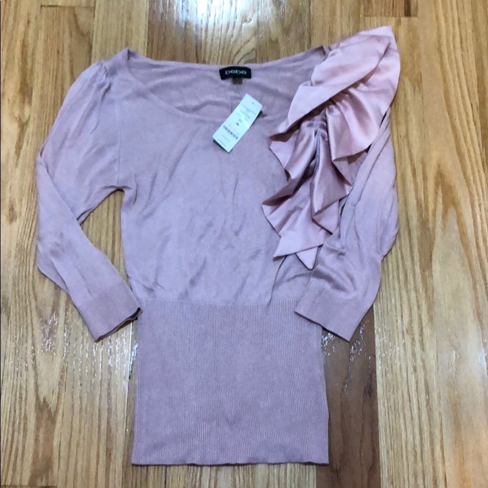 Bebe size M pink sweater with satin ruffle